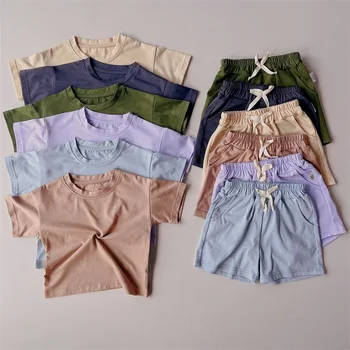 Нов летен детски комплект, модни и ежедневни однотонная тениска за момичета, панталони с къс ръкав, спортен комплект, обикновен мек комплект от две части с къс ръкав